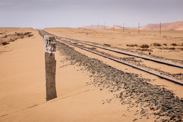 a railway track through the desert
